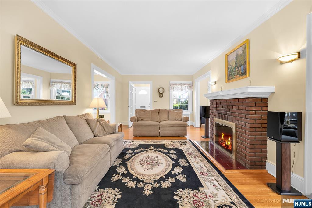 106 Maple Street Rutherford, NJ 07070 - Photo 9 of 50 a living room with furniture and a fireplace