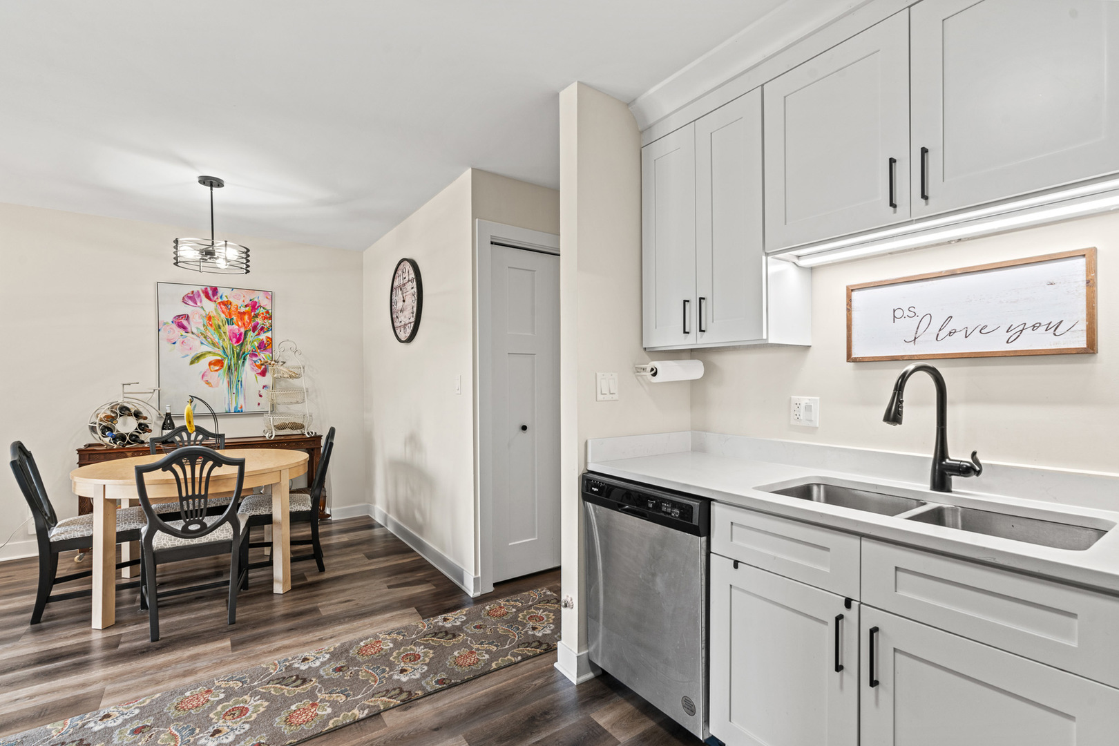 1598 Elder Drive Aurora, IL 60506 - Photo 10 of 22 a kitchen with stainless steel appliances granite countertop a sink a stove and cabinets