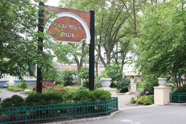 a sign that is on the side of a road