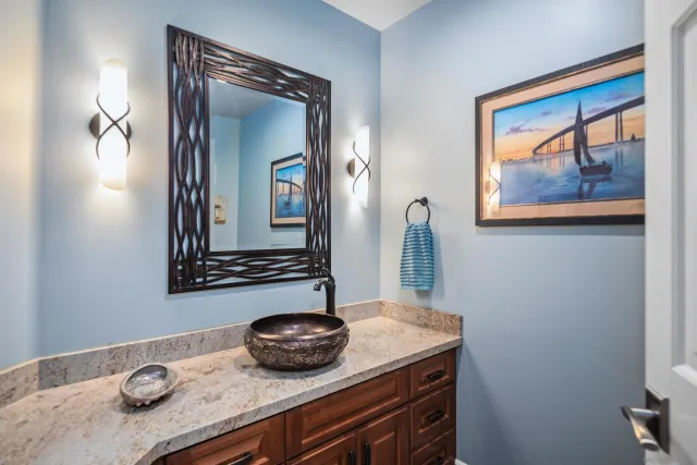 a bathroom with a sink and a mirror