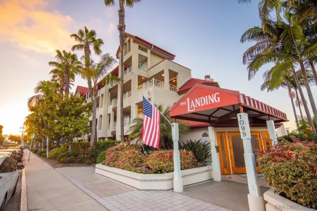 a view of a house with a tree