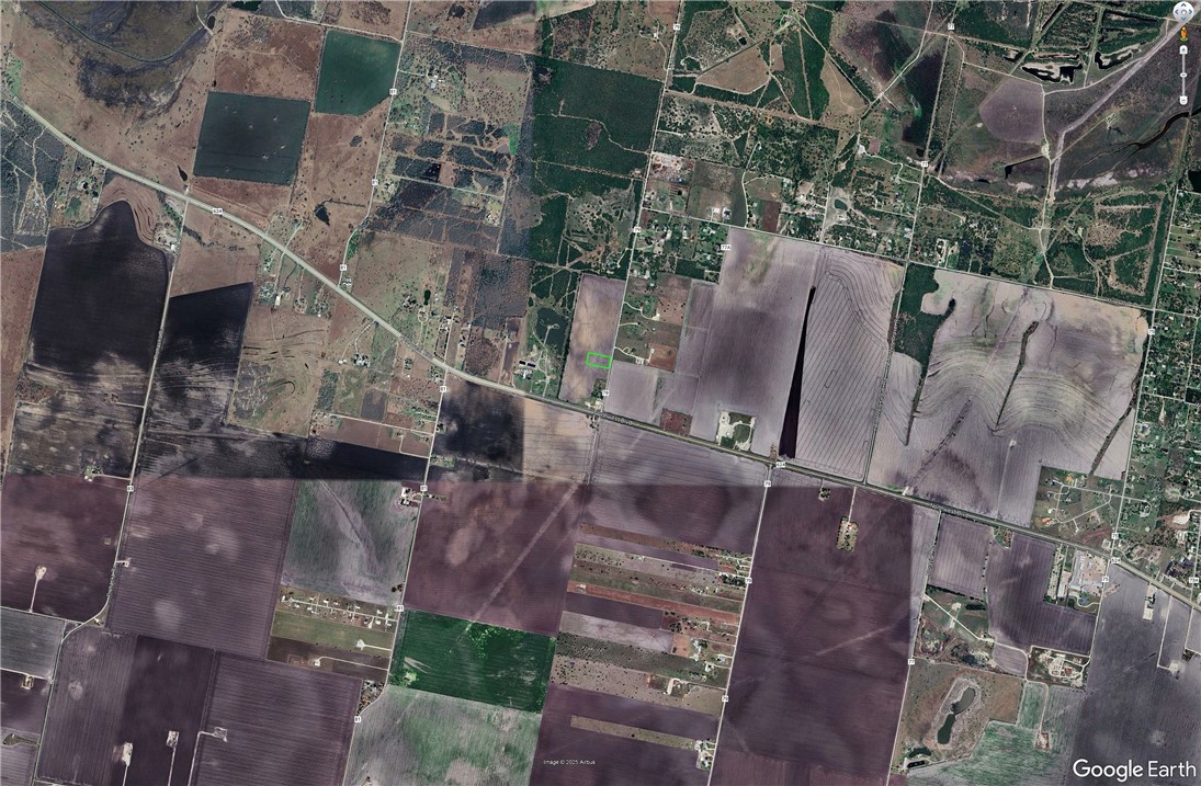 0 County Road 79 Robstown, TX 78380 - Photo 10 of 10 an aerial view of a backyard with table and chairs with wooden fence