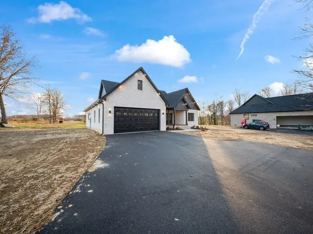 a view of street with parked cars