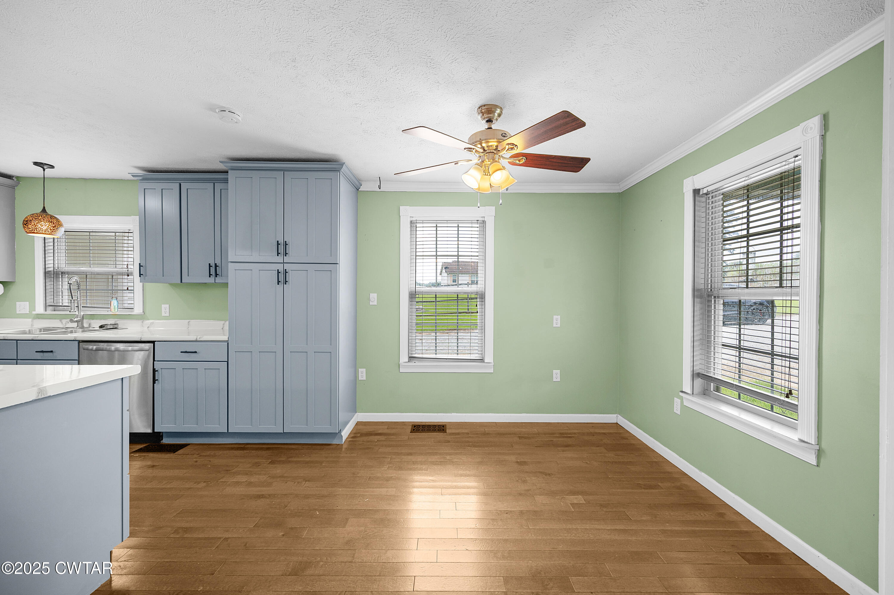 1675 Emerson Road Henderson, TN 38340 - Photo 13 of 21 a view of a kitchen with a dishwasher cabinets and a large window