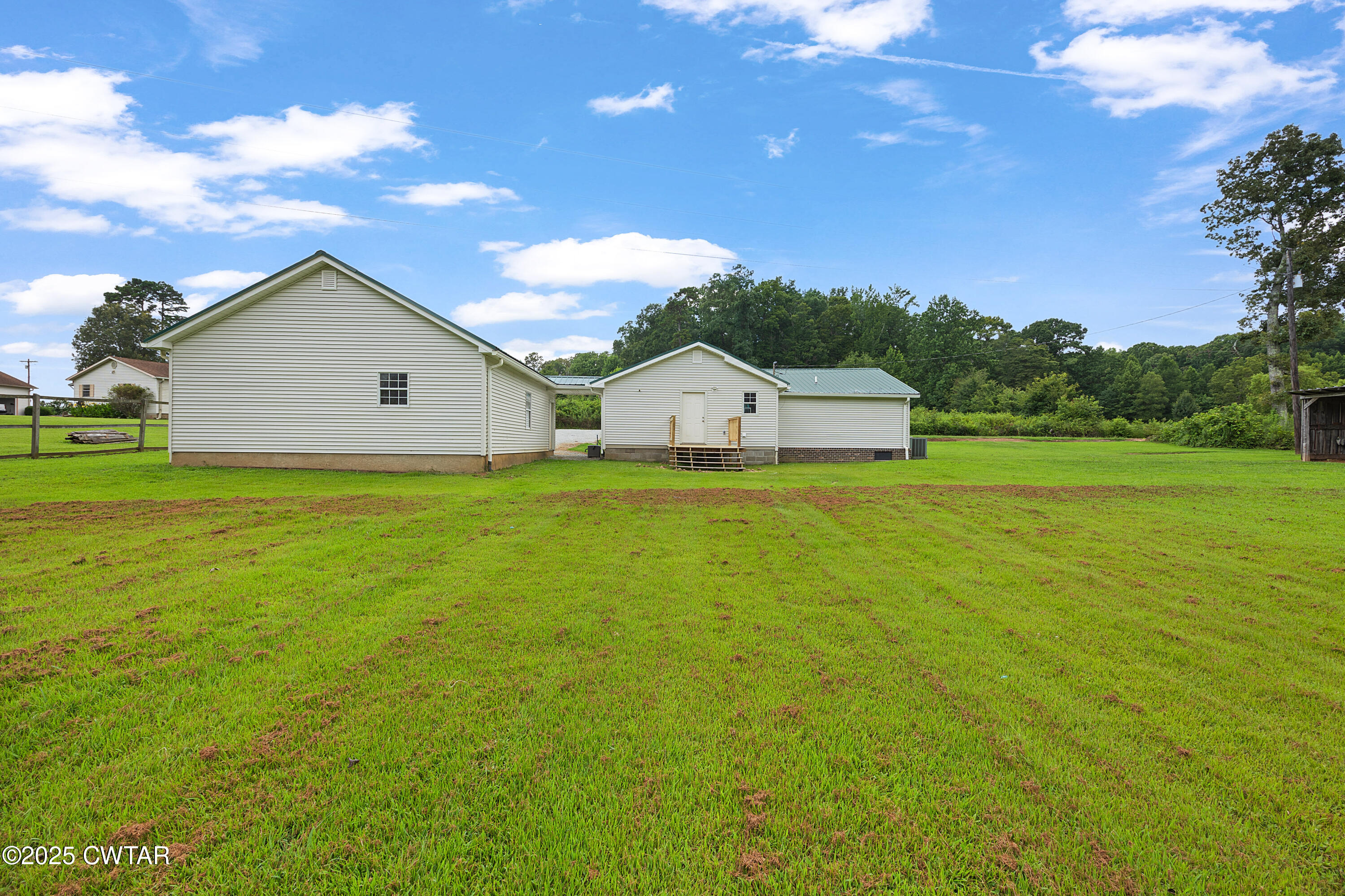 1675 Emerson Road Henderson, TN 38340 - Photo 5 of 21 a view of a house with a yard
