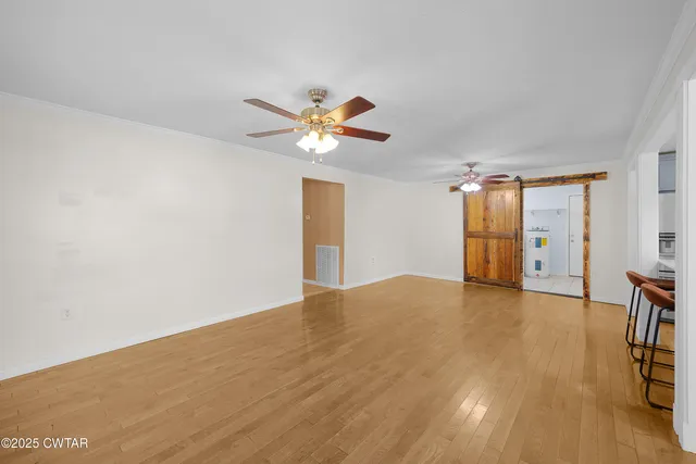 a view of a livingroom with a stove