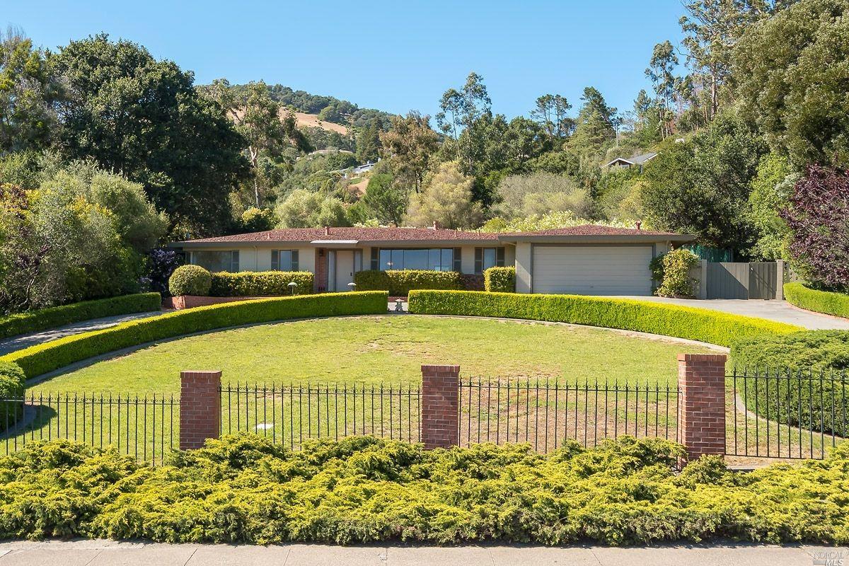 337 Point San Pedro Road San Rafael, CA 94901 - Photo 1 of 1 a front view of a house with a garden