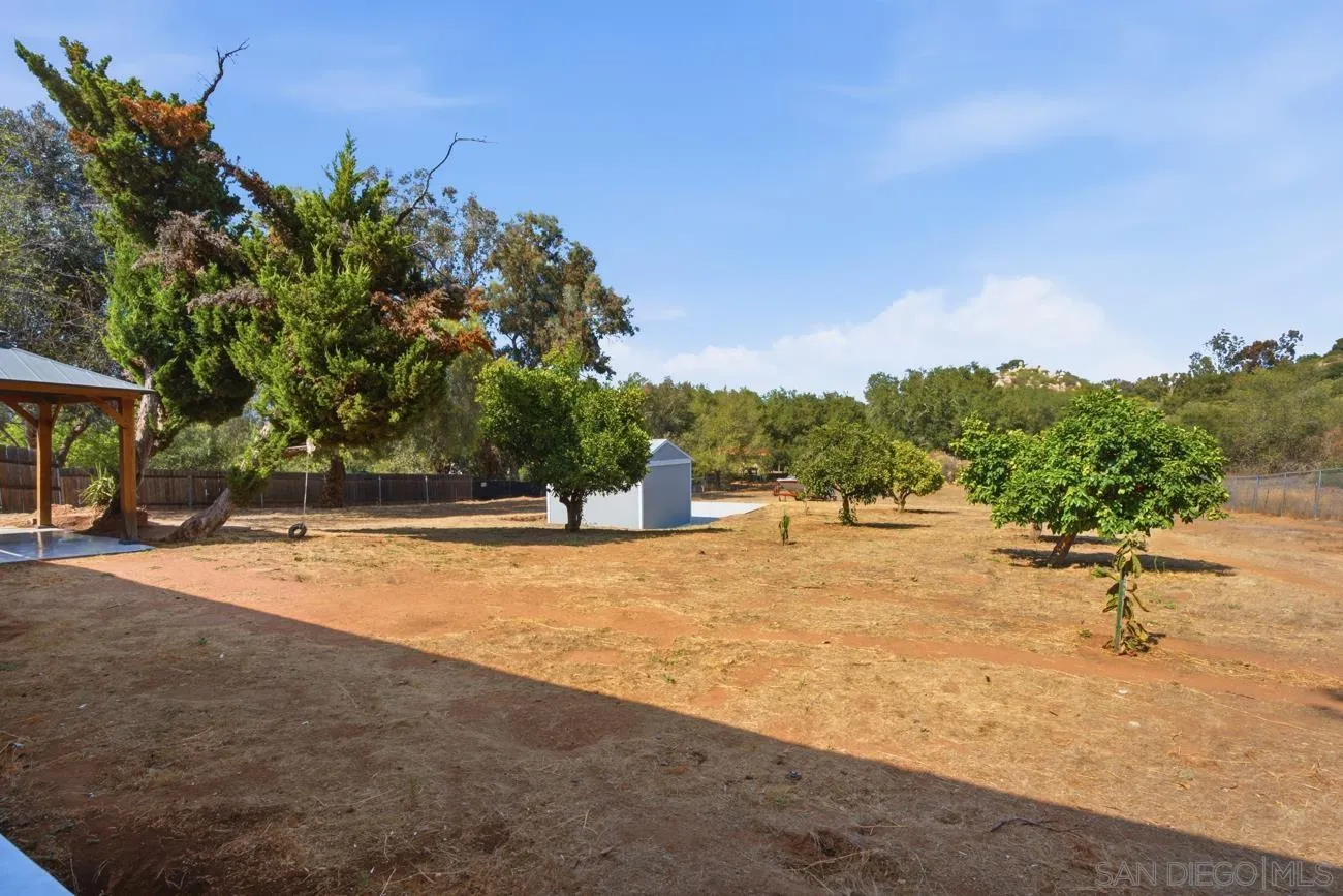 15773 Oak Valley Road Ramona, CA 92065 - Photo 41 of 42 Back yard showing fruit trees.