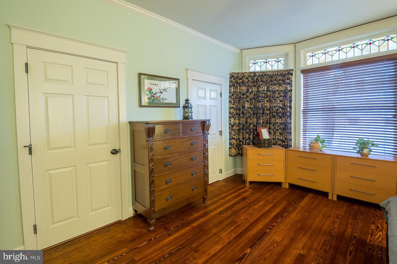 1043 Washington Street Reading, PA 19601 - Photo 25 of 40 a view of a bedroom with furniture and window