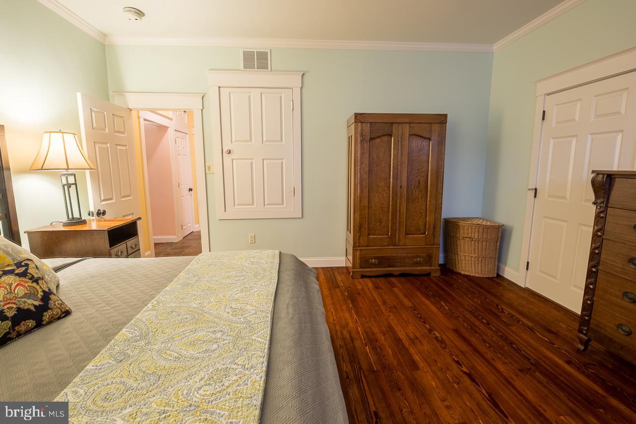 1043 Washington Street Reading, PA 19601 - Photo 30 of 40 a bedroom with a bed and a dresser