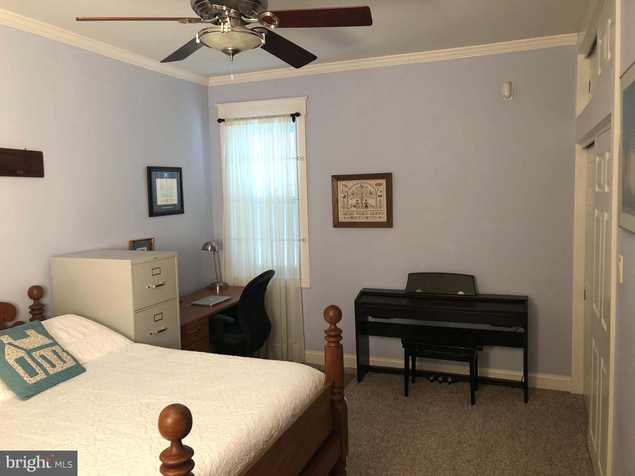 1043 Washington Street Reading, PA 19601 - Photo 32 of 40 a bedroom with furniture and a window