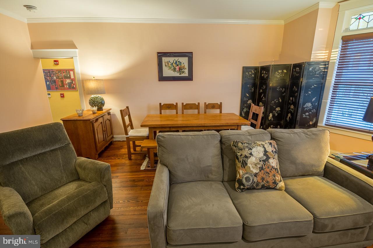 1043 Washington Street Reading, PA 19601 - Photo 6 of 40 a living room with furniture and a flat screen tv