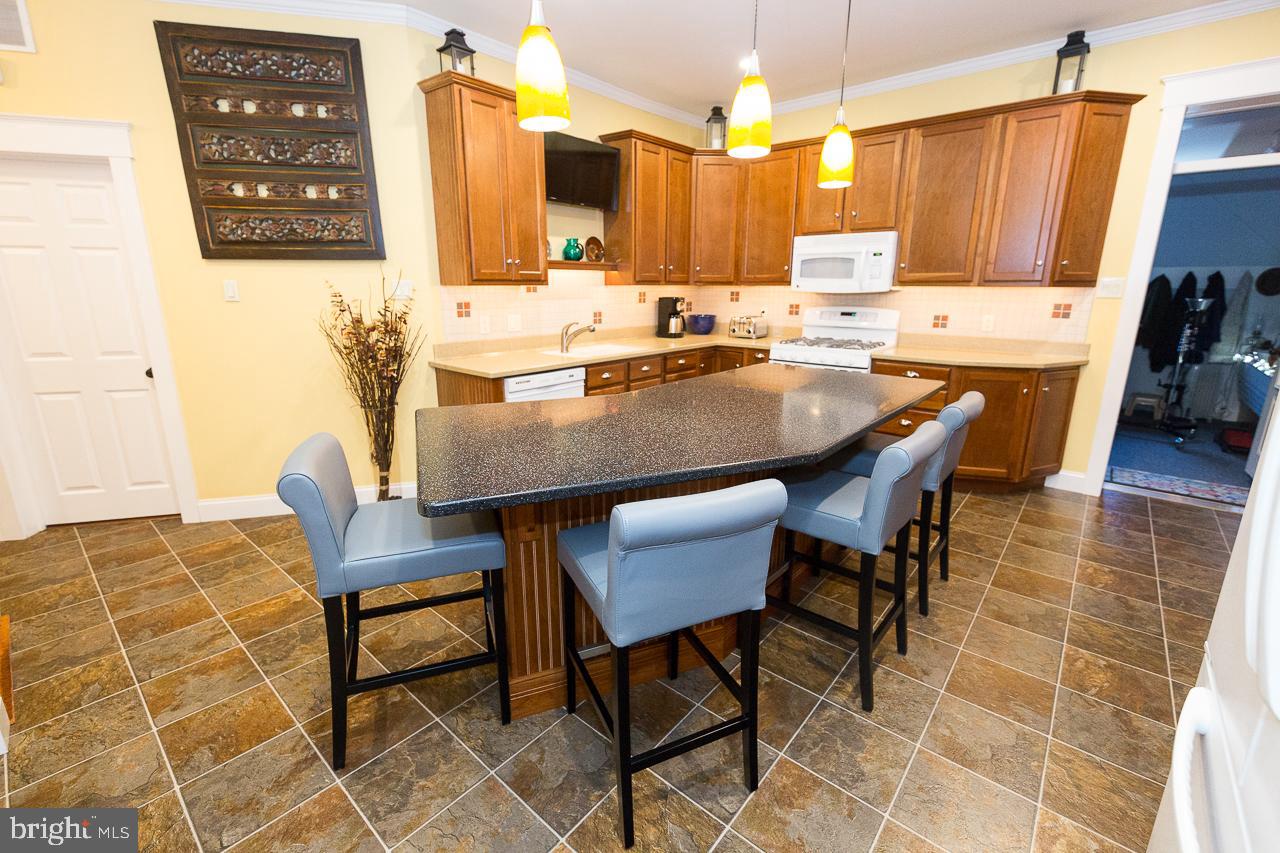 1043 Washington Street Reading, PA 19601 - Photo 10 of 40 a view of a dining room with furniture