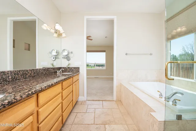 a bathroom with a bathtub and a sink