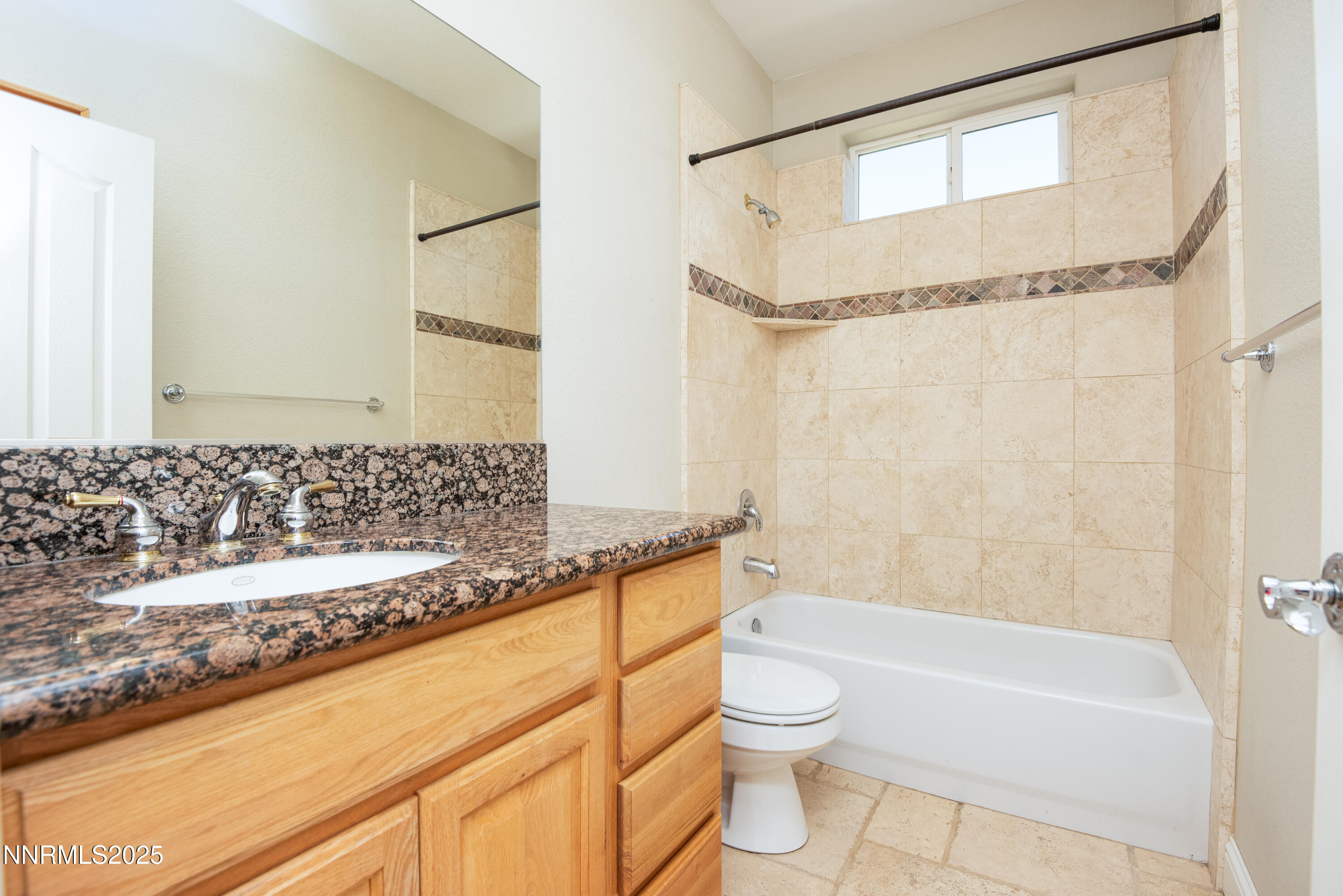 544 Upper Colony Road Wellington, NV 89444 - Photo 21 of 47 a bathroom with a granite countertop bathtub shower sink vanity and toilet