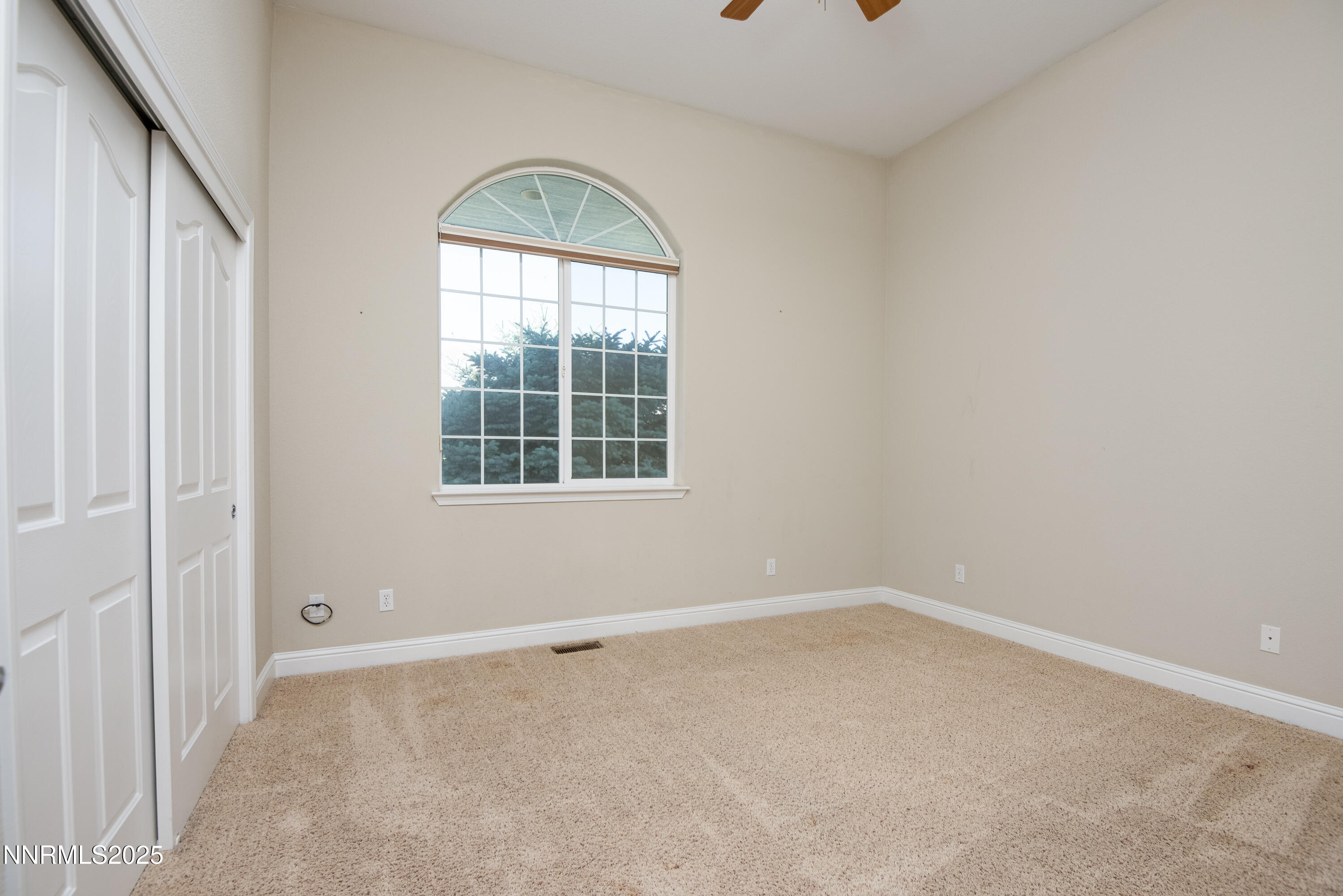 544 Upper Colony Road Wellington, NV 89444 - Photo 25 of 47 an empty room with a window