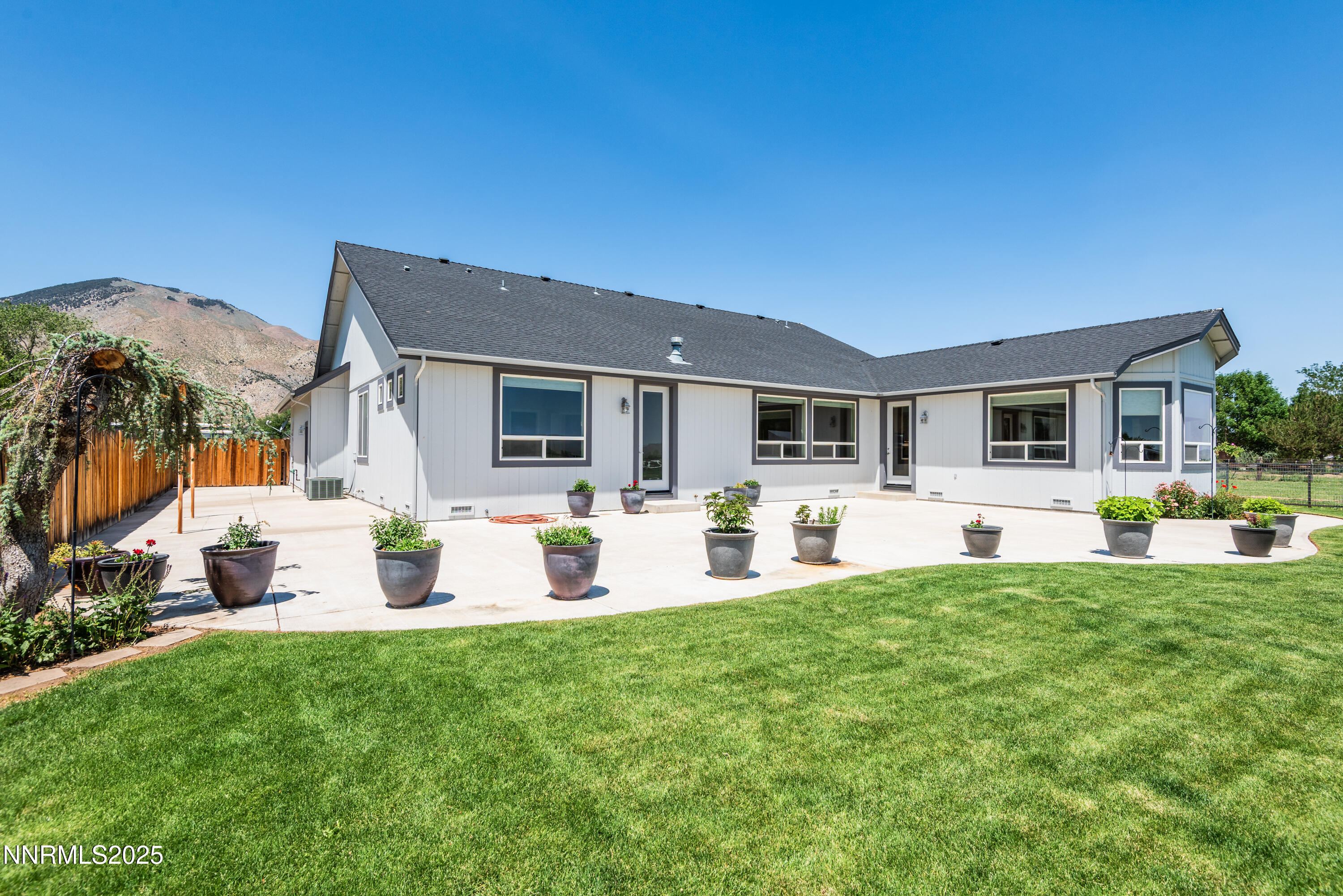 544 Upper Colony Road Wellington, NV 89444 - Photo 4 of 47 a front view of a house with patio