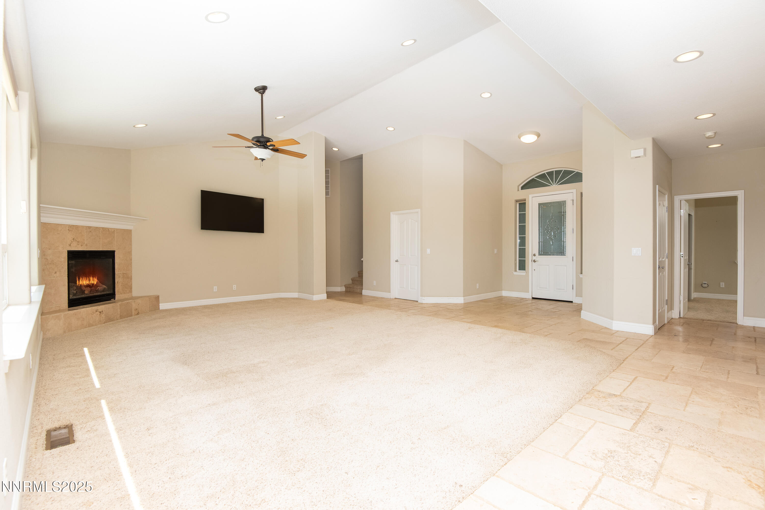 544 Upper Colony Road Wellington, NV 89444 - Photo 8 of 47 a view of an empty room with a fireplace