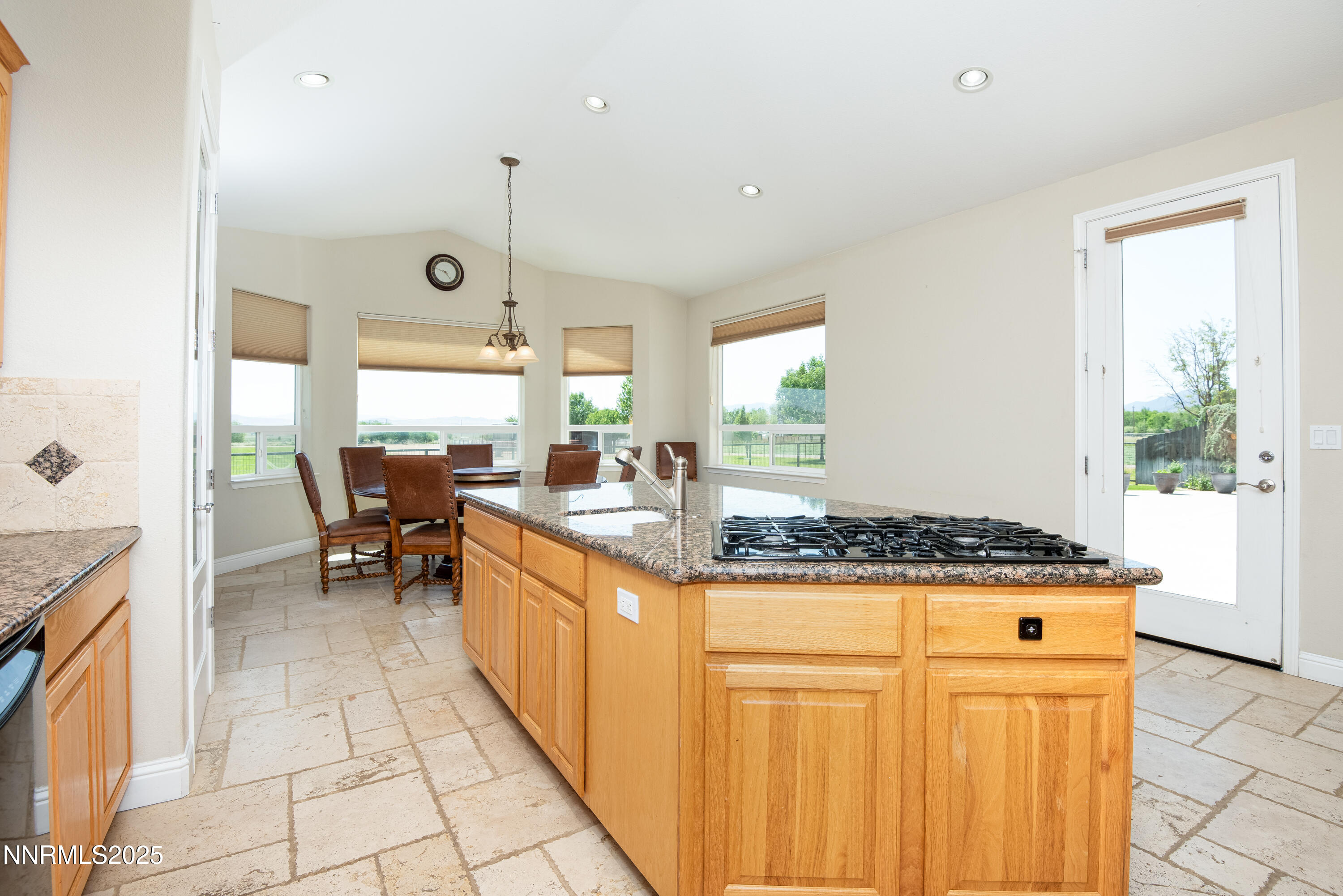 544 Upper Colony Road Wellington, NV 89444 - Photo 9 of 47 a kitchen with stainless steel appliances granite countertop a stove and a sink