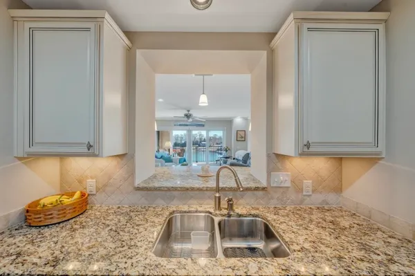 a large bathroom with a double vanity sink a large mirror and shower