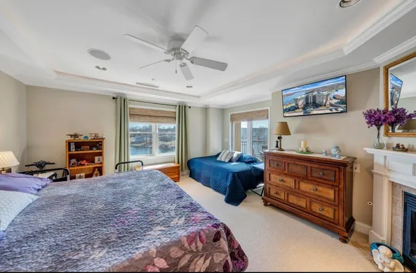 a white toilet sitting next to a shower curtain