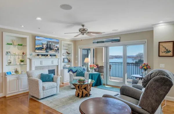 a kitchen with stainless steel appliances granite countertop a refrigerator and a stove