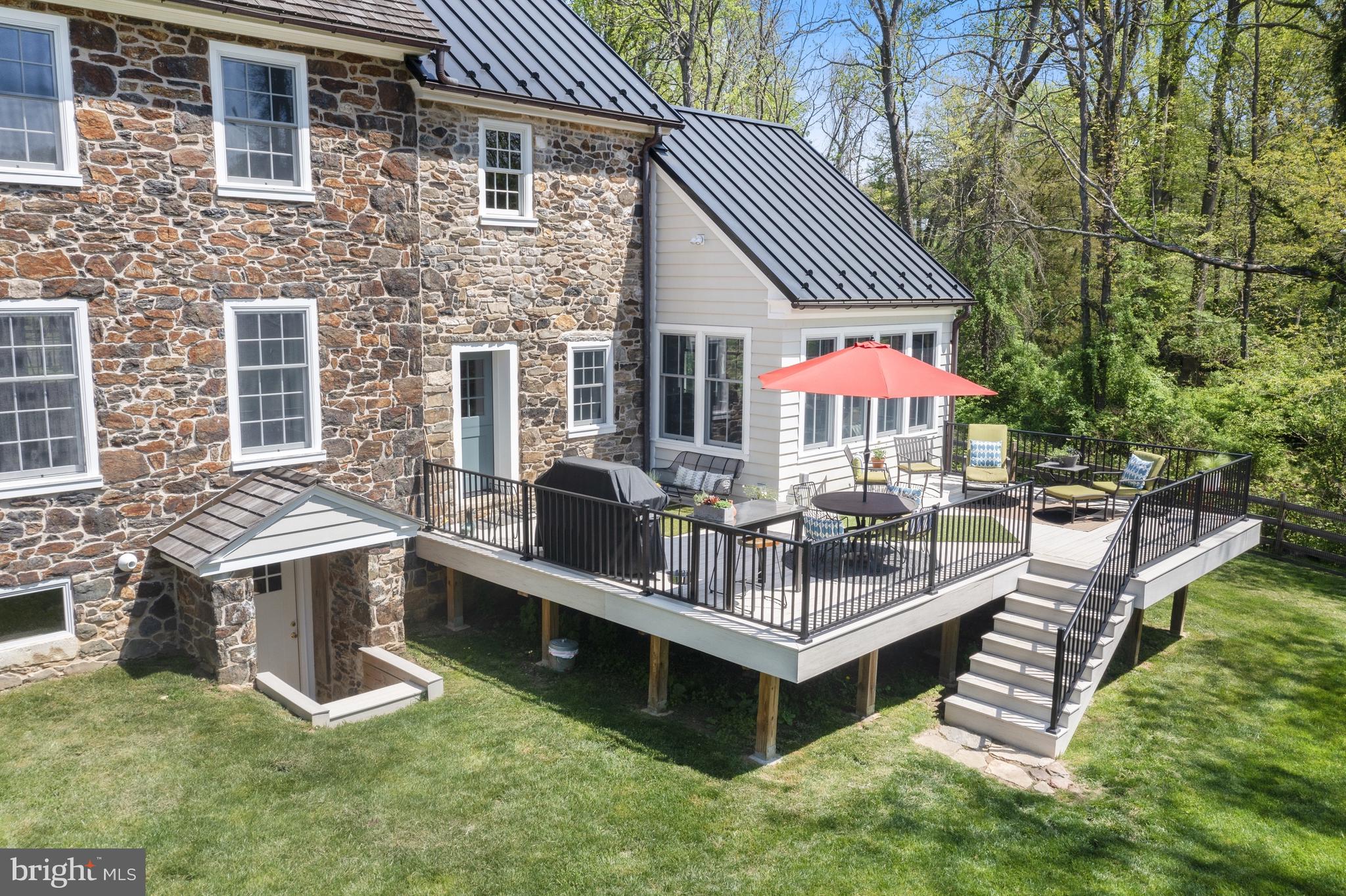 1250 Hillendale Road Chadds Ford, PA 19317 - Photo 55 of 76 a view of a house with a backyard and sitting area
