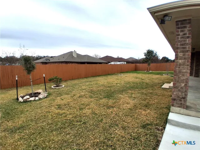 a view of a house with a street