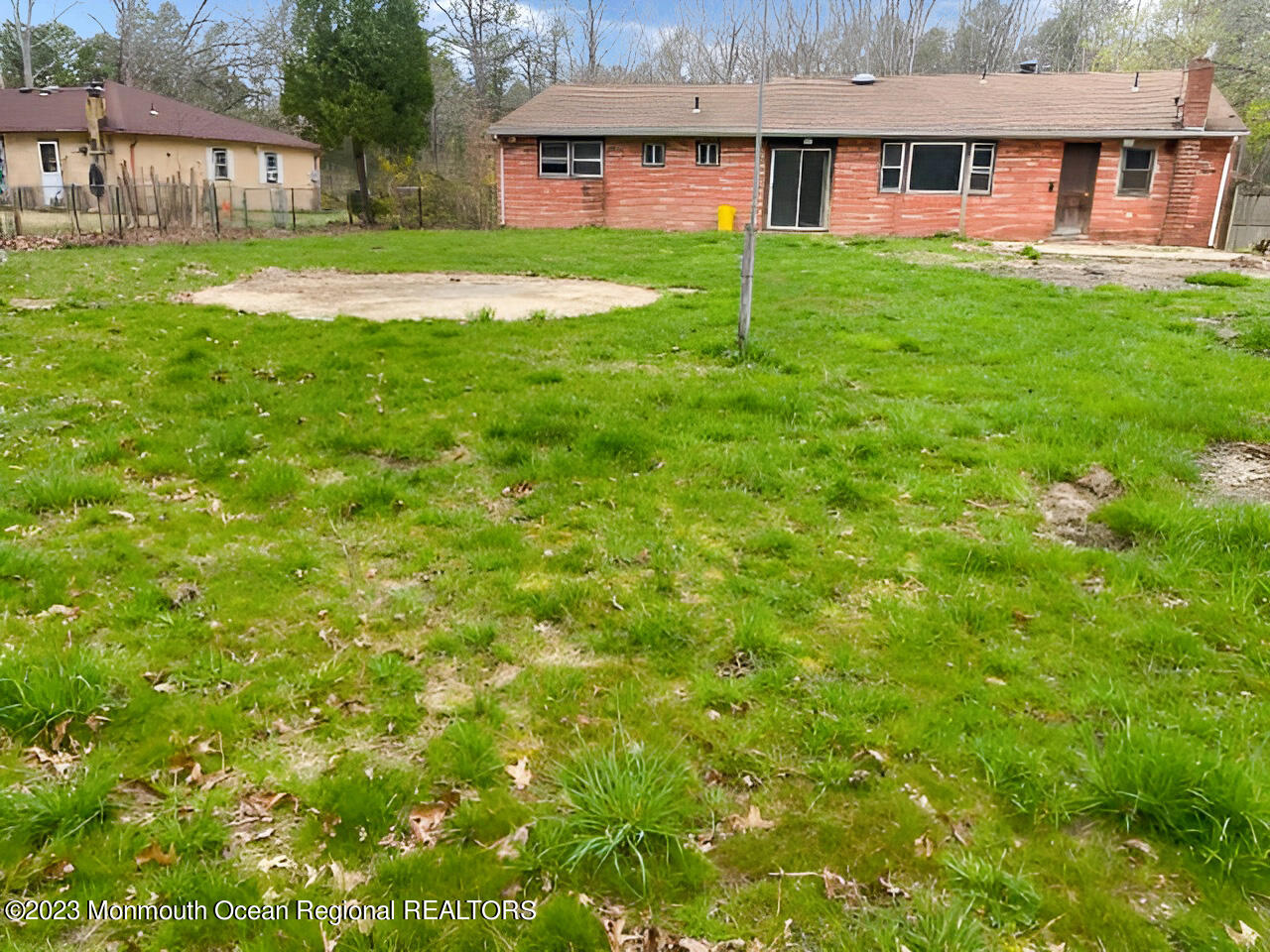 835 Bowman Road Jackson, NJ 08527 - Photo 2 of 10 a view of a house with a big yard and large trees