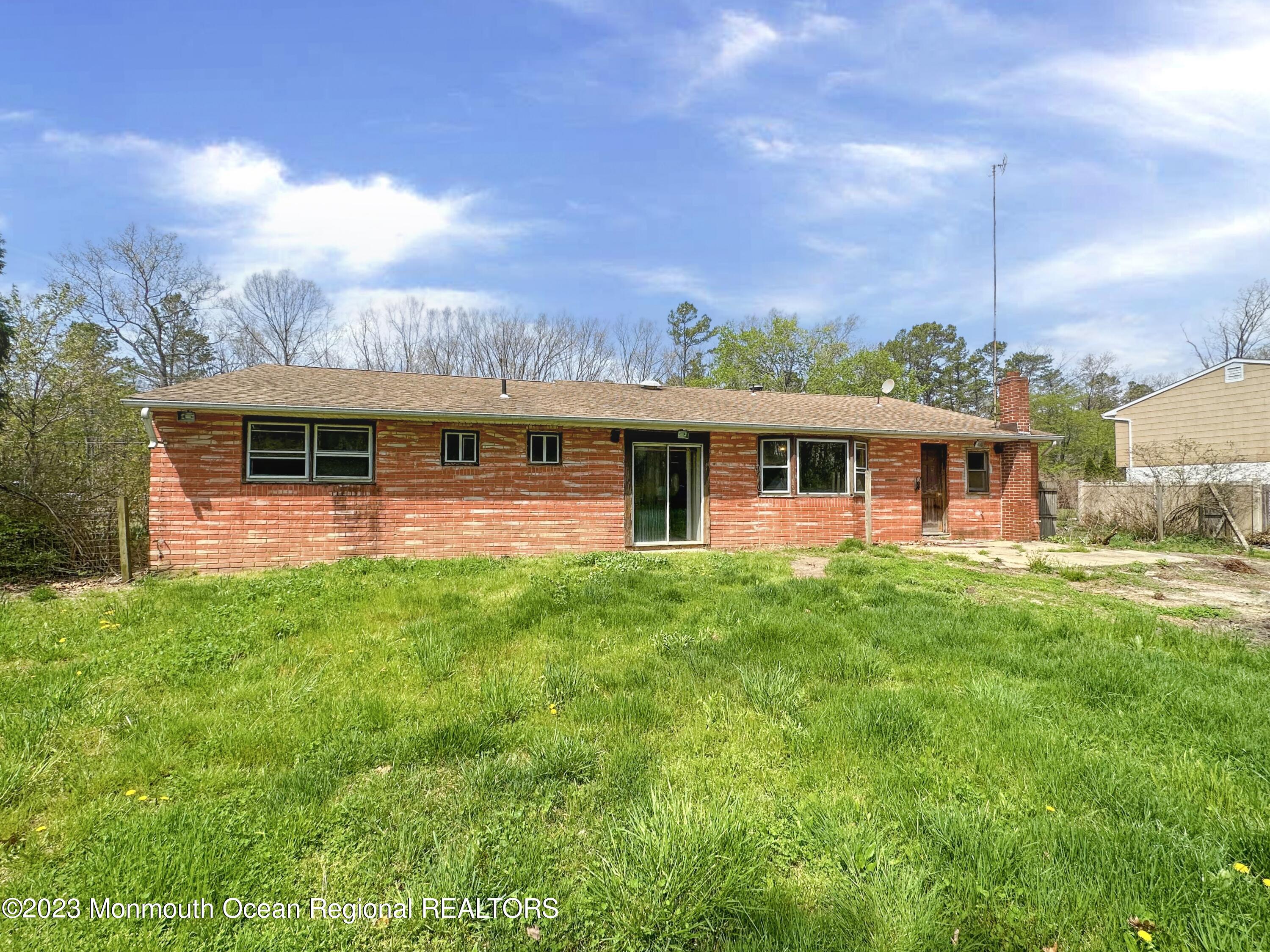 835 Bowman Road Jackson, NJ 08527 - Photo 3 of 10 a front view of house with yard and green space