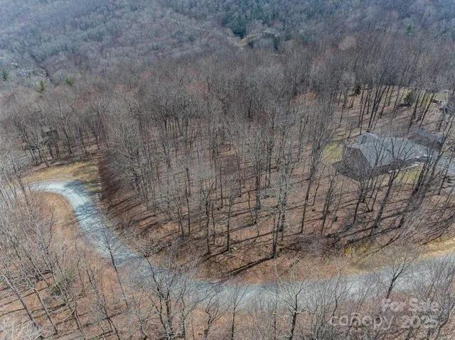 a view of a backyard of the house