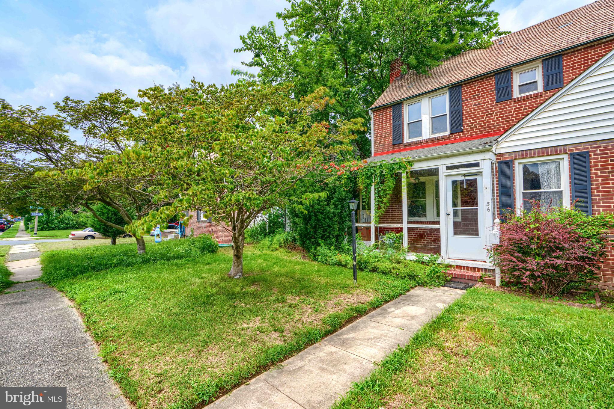 56 Yorkway Baltimore, MD 21222 - Photo 2 of 34 front view of a house with a yard