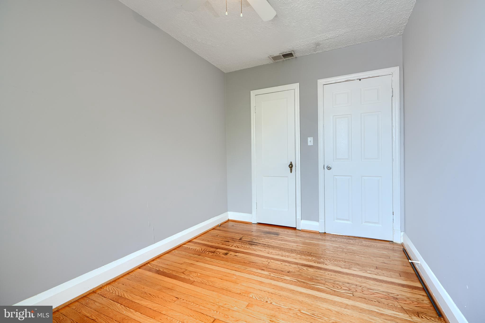 56 Yorkway Baltimore, MD 21222 - Photo 25 of 34 a view of a room with wooden floor