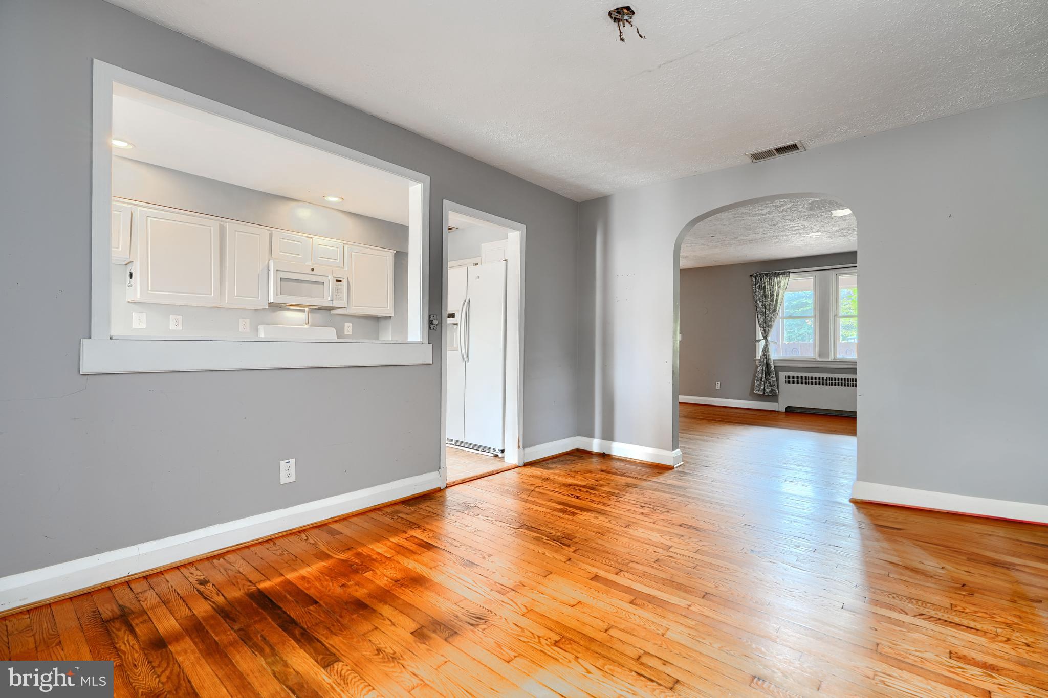 56 Yorkway Baltimore, MD 21222 - Photo 10 of 34 a view of empty room with wooden floor