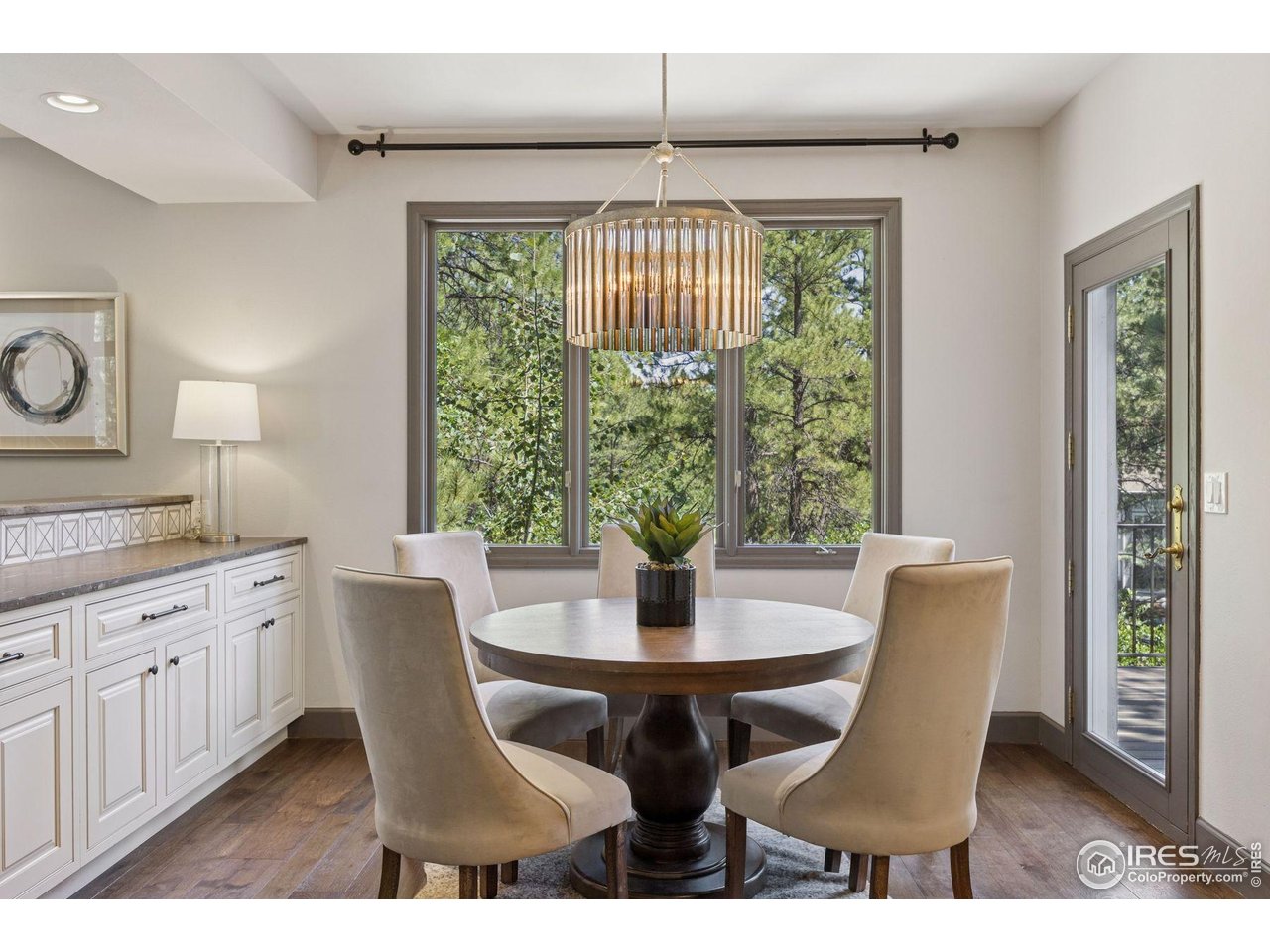 65 Indigo Way Castle Rock, CO 80108 - Photo 12 of 50 a view of a dining room with furniture window and outside view