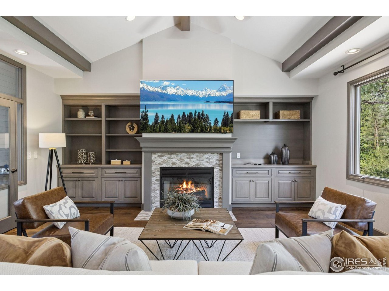 65 Indigo Way Castle Rock, CO 80108 - Photo 13 of 50 a living room with furniture and a fireplace