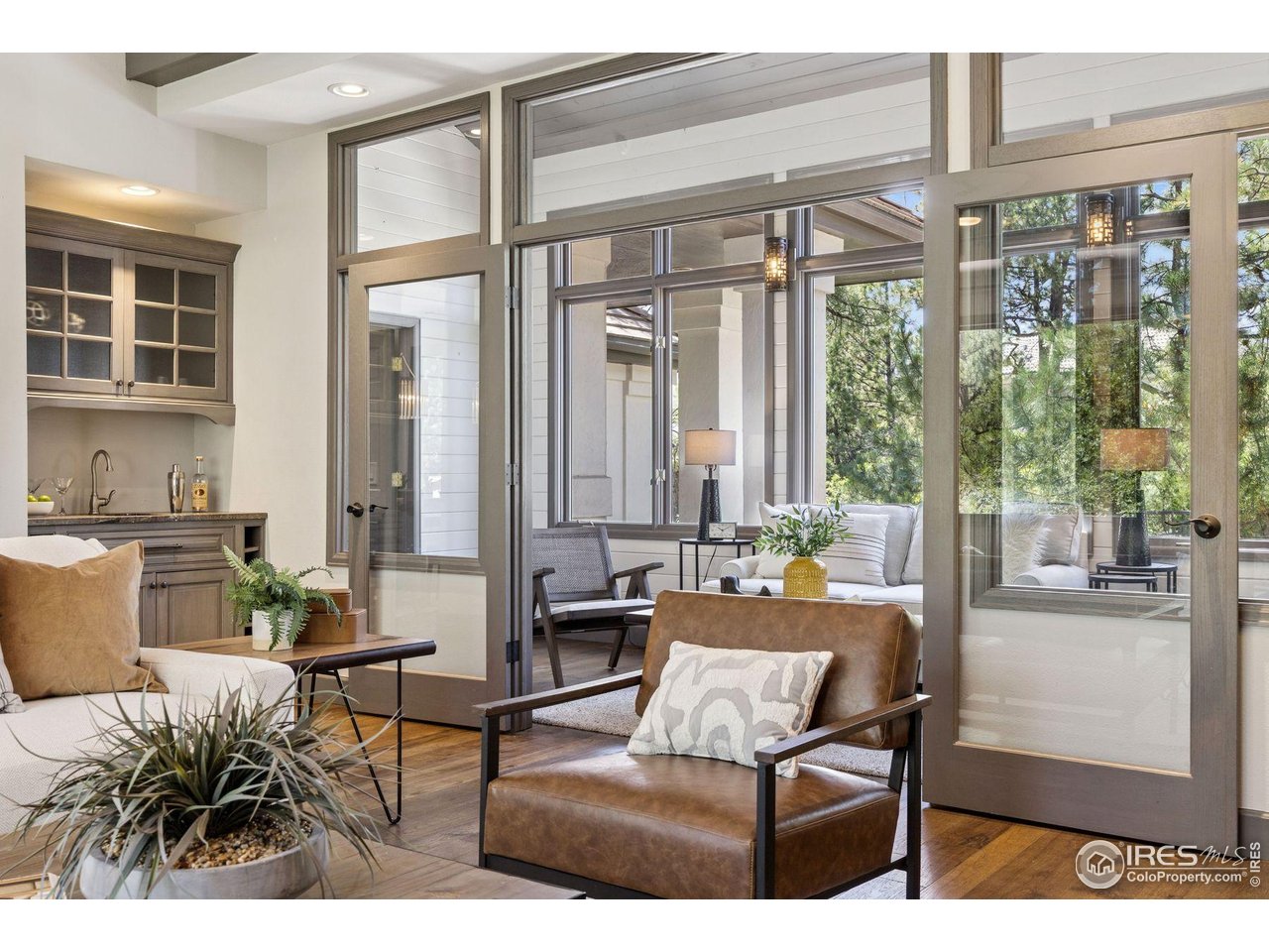 65 Indigo Way Castle Rock, CO 80108 - Photo 15 of 50 a living room with furniture and large windows
