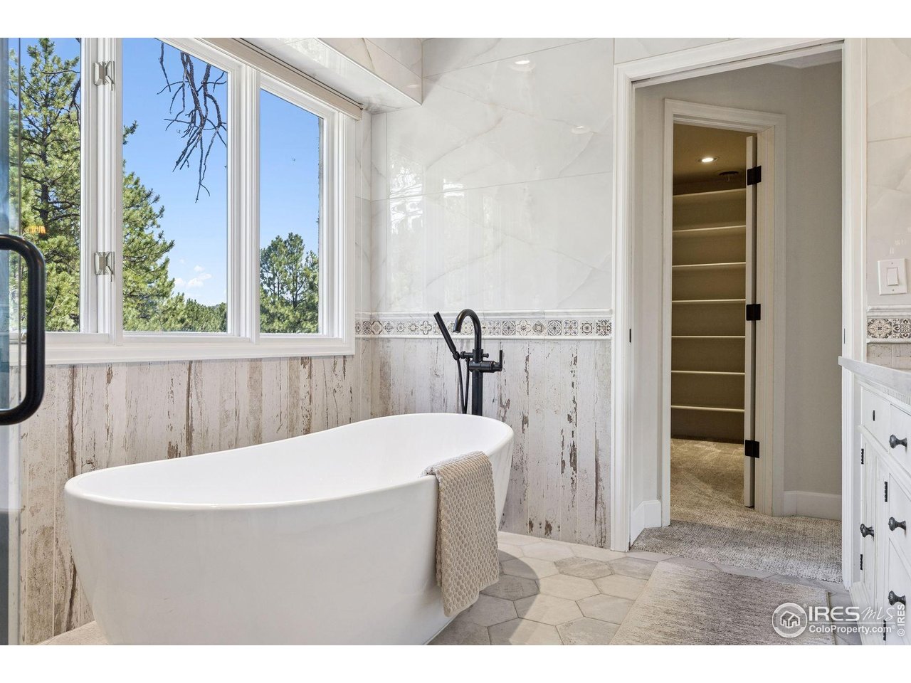 65 Indigo Way Castle Rock, CO 80108 - Photo 36 of 50 a dining room with furniture and window
