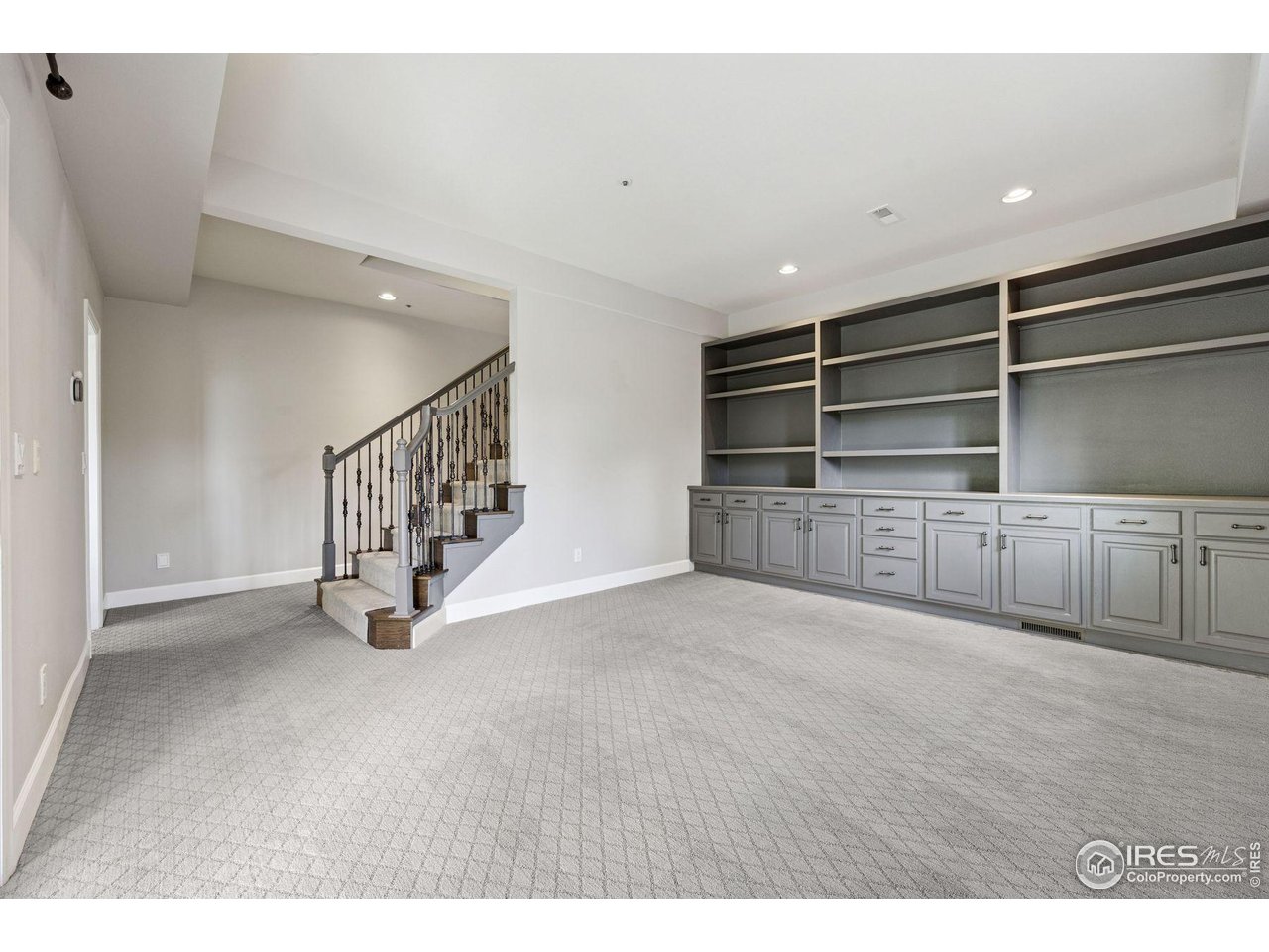 65 Indigo Way Castle Rock, CO 80108 - Photo 37 of 50 a view of an empty room with staircase