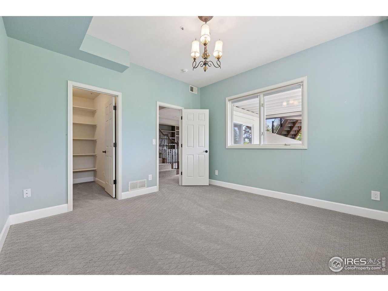 65 Indigo Way Castle Rock, CO 80108 - Photo 42 of 50 a view of an empty room with a window