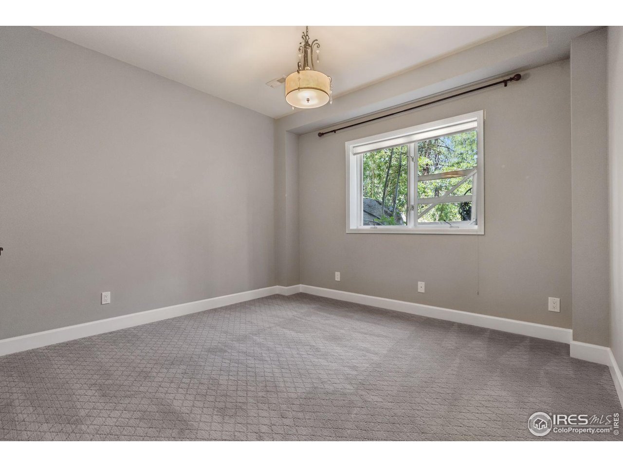 65 Indigo Way Castle Rock, CO 80108 - Photo 48 of 50 a view of an empty room with windows