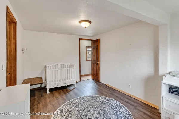 a view of livingroom with furniture and wooden floor