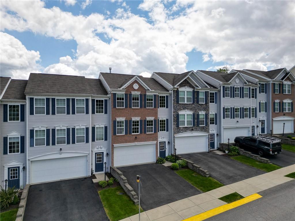 131 Rylie Drive Harmony, PA 16037 - Photo 2 of 34 a front view of a house with a yard