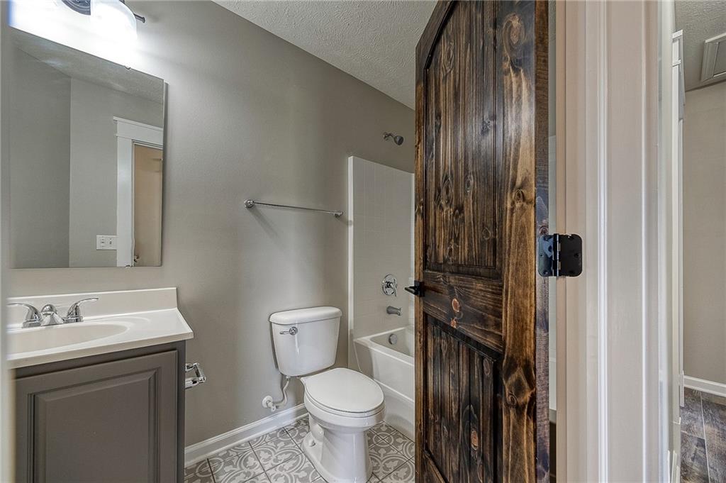 131 Rylie Drive Harmony, PA 16037 - Photo 21 of 34 a bathroom with a sink toilet and shower