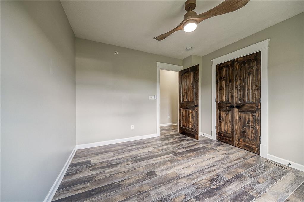 131 Rylie Drive Harmony, PA 16037 - Photo 23 of 34 a view of a room with wooden floor