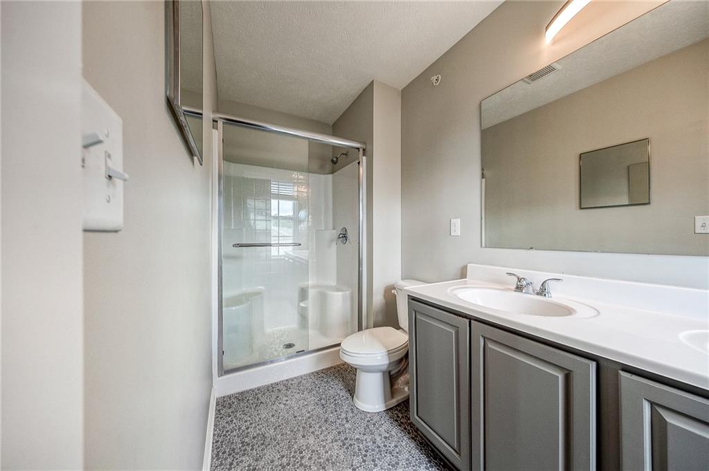 131 Rylie Drive Harmony, PA 16037 - Photo 27 of 34 a bathroom with a sink a toilet and shower