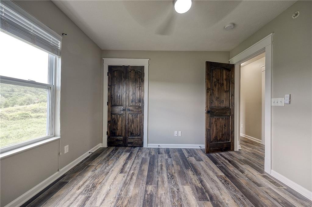 131 Rylie Drive Harmony, PA 16037 - Photo 30 of 34 a view of a room with wooden floor and window