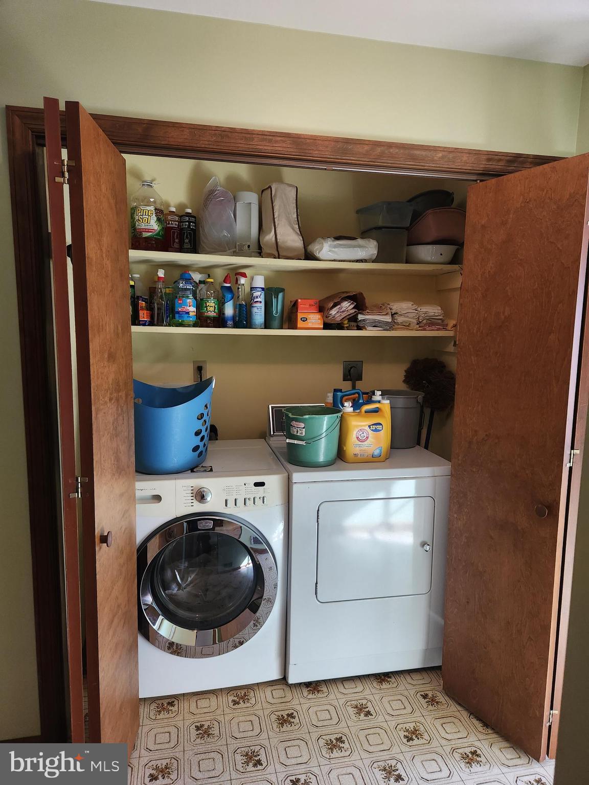 236 Pittsburg Valley Road Conestoga, PA 17516 - Photo 17 of 75 a view of washer and dryer in a shelf