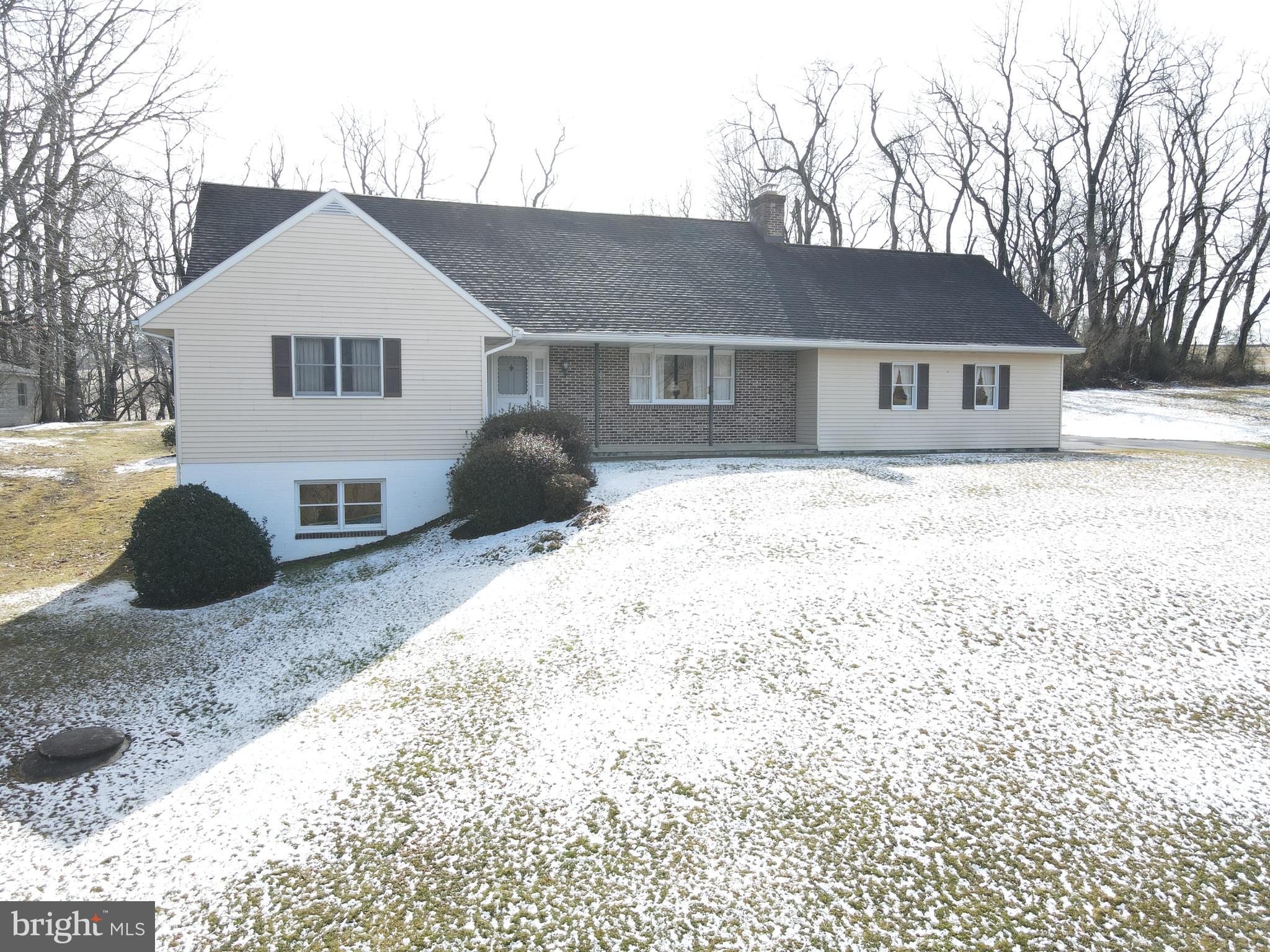 236 Pittsburg Valley Road Conestoga, PA 17516 - Photo 2 of 75 a front view of a house with a yard