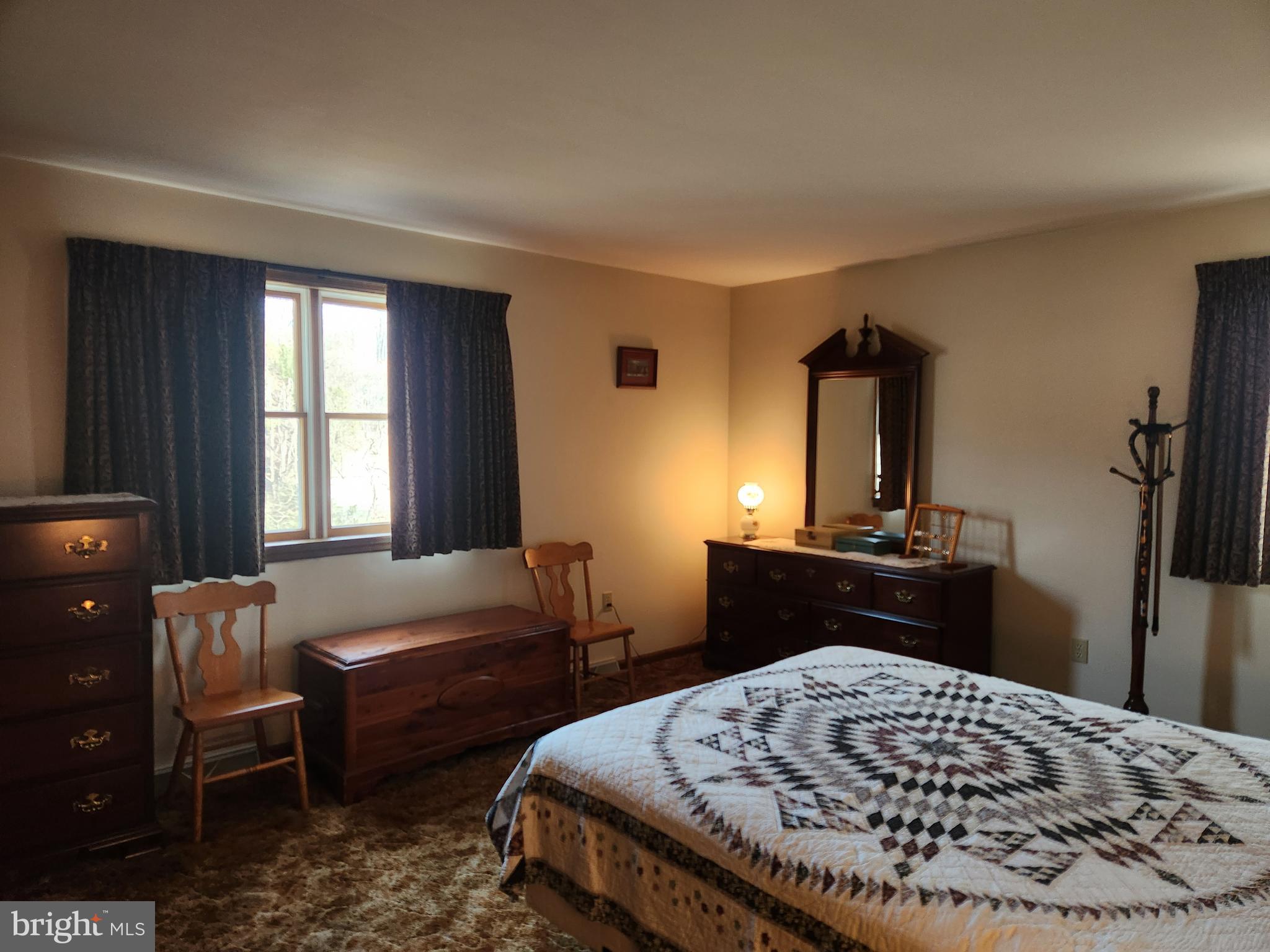 236 Pittsburg Valley Road Conestoga, PA 17516 - Photo 21 of 75 a bedroom with a bed and a table